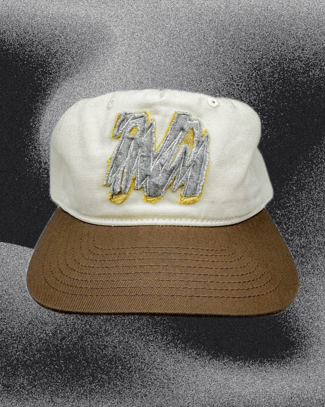 Two-tone ‘Shatter M’ patchwork cap